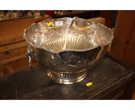 A silver plated punch bowl with ladle 