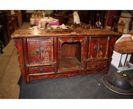 A Chinese elm table top cabinet 