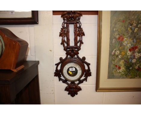 An early 20th Century oak barometer