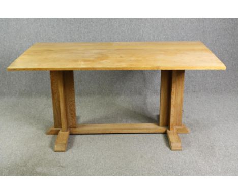 In the manner of Heals, a light oak Arts and Crafts refectory table H.75 W.158 D.86cm. 