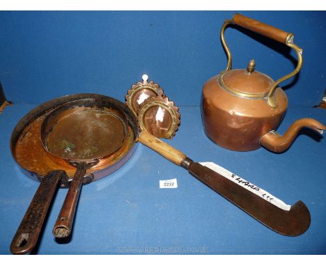 Two Victorian copper skillet pans, pair of Victorian trench art horse shoe ornaments and Victorian copper kettles.