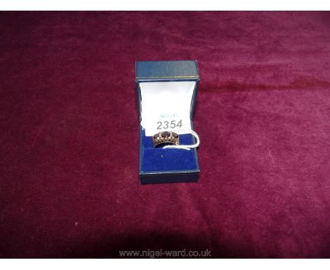 An old 9 ct Gold Garnet gypsy Ring, size R, 4.6 gms, hallmarked.