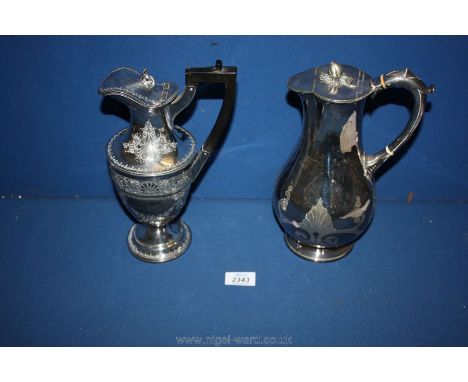 An elegant silver plated Ewer/hot water vessel having scroll and floral garland decoration and hinged lid, 10 3/8'' tall and 