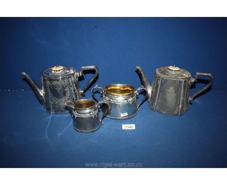 Two electro plated Britannia metal Teapots of identical shape, one plain, the other having profuse stylised floral decoration