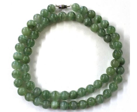 A jade bead necklace