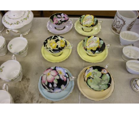 A set of six Paragon floral decorated teacups and saucers