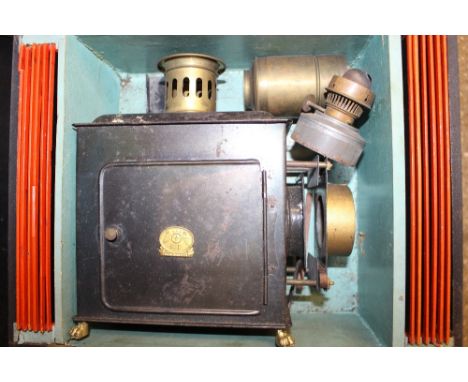 A 19th Century German tin plate Magic Lantern with slides and original box