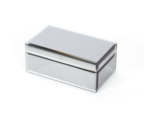 A mirrored glass trinket casket