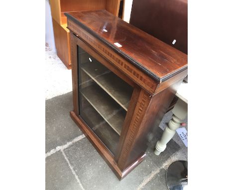 A Victorian inlaid dwarf bookcase with glazed door 