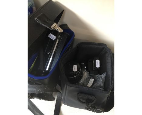 A Pentax ME camera and Boots Compact 2000 hand held video camera 