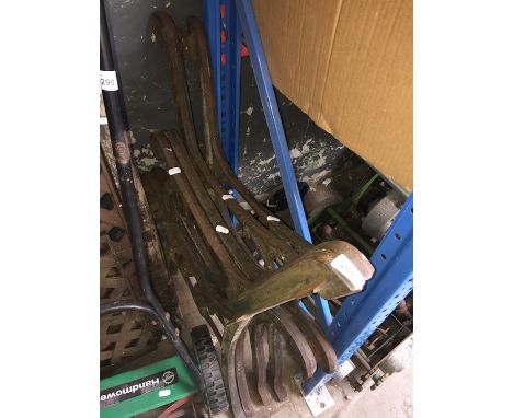 2 pairs of cast iron bench ends, a cast iron bench back and chair back. 