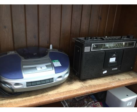 A Hitachi CX 150 CD / cassette player and a Superscope Marantz CRS-2024 stereo / cassette recorder / radio. 