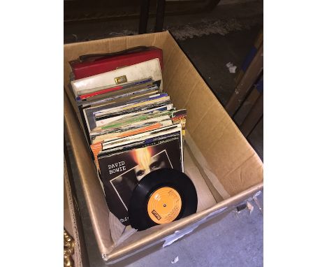 Box of 45 single records, mainly Bowie, Rolling Stones, Beatles, Status Quo, many in picture sleeves.