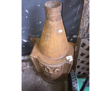 An ornate cast iron hopper, dated 1904. 