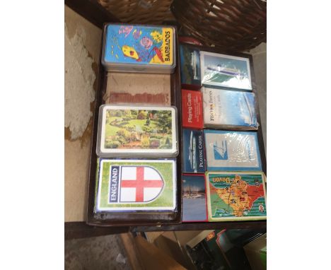 A case of vintage playing cards, ,mainly shipping and railway themes. 