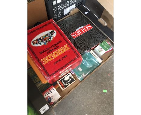 A box of playing cards and Disney books 