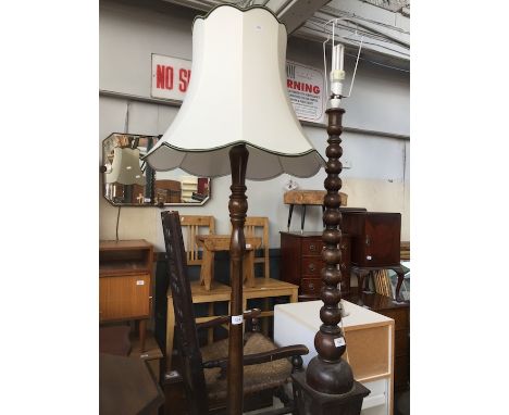 A stained beech standard lamp. 
