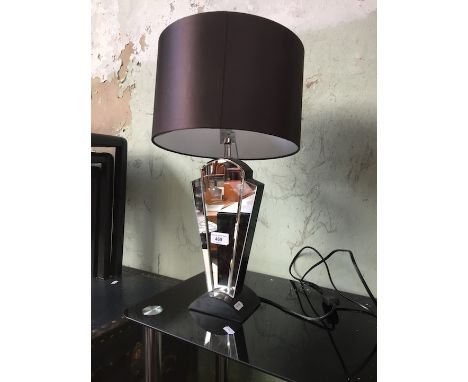 A modern Art Deco style mirror table lamp. 