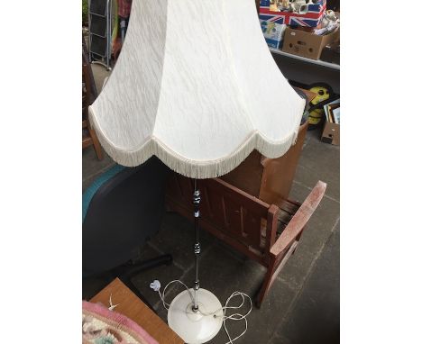 An industrial style metal standard lamp. 