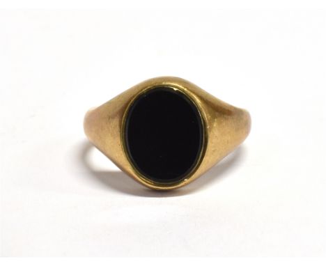 A 9CT GOLD BLACK HARDSTONE SIGNET RING Birmingham hallmark, size K ½ weight 3.4grams