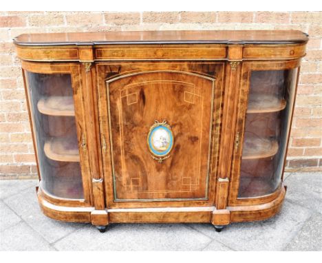 A VICTORIAN GILT METAL MOUNTED WALNUT CREDENZA  with marquetry decoration, the central door centred with a pictorial plaque o