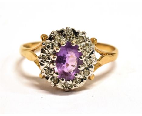 A PURPLE ALMANDINE AND WHITE SAPPHIRE CLUSTER RING  cluster measurement 1 x 1cm, shank hallmarked, ring size O ½ - P, weight 