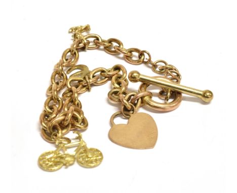 A TAGGED 9CT CHAIN BRACELET  with four attached charms, the bracelet with toggle clasp, one charm marked 9KT , one with 375 j