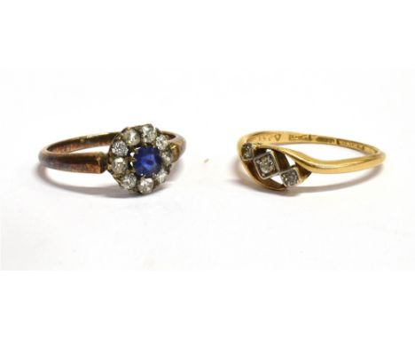 TWO ART DECO RINGS A marked 18ct diamond and sapphire flower ring, size M 1/2, weight 2.5g A diamond accent cross over ring, 