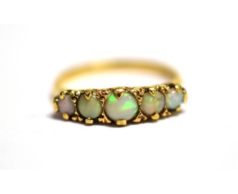 A 9CT GOLD, OPAL FIVE STONE DRESS RING  the shank with faded hallmark, ring size Q, weight 2.9grams