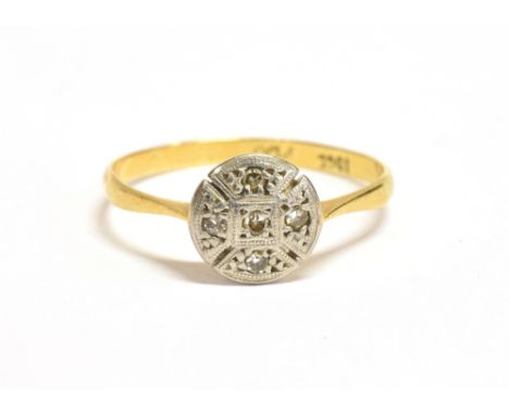 AN 18CT GOLD PLATINUM AND DIAMOND ACCENTED VINTAGE PLAQUE RING the circular plaque measuring approx. 0.6cm in diameter, shank