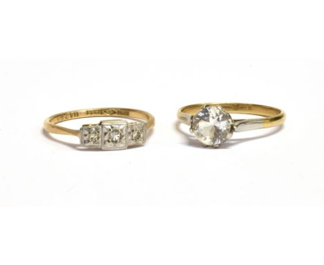 TWO 9CT GOLD RINGS  a 9ct gold platinum and diamond accented dress ring, size P, weight 1.6grams, a 9ct gold goshenite solita