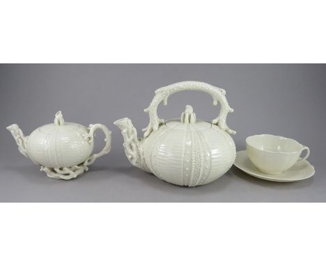 A Belleek first period three piece tea set, all moulded in the form of Echinus, c.1869. All marked to the underside. Comprisi