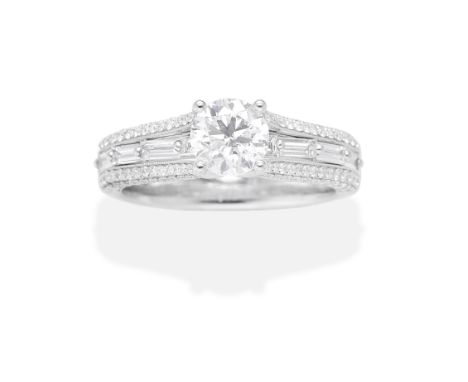 SAVVY &amp; SAND: DIAMOND RINGThe brilliant-cut diamond weighing 0.80 carat, between baguette and brilliant-cut diamond shoul