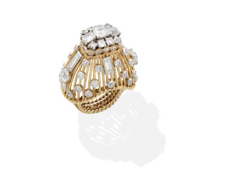 MONTURE CARTIER: DIAMOND RING, CIRCA 1970Old brilliant and baguette-cut diamonds, on a wirework basket frame, with rope twist