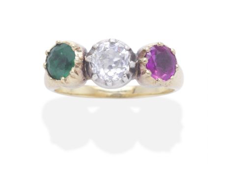 RUBY, EMERALD AND DIAMOND RING, EARLY 19TH CENTURYThe old cushion-shaped diamond, circular-cut ruby and emerald, in closed-ba