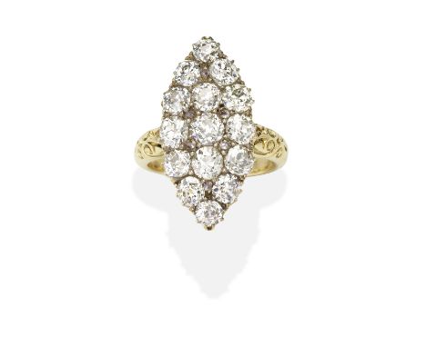 DIAMOND NAVETTE RING, LATE 19TH CENTURYOld brilliant-cut diamonds between scrolled shoulders, mounted in gold, diamonds appro