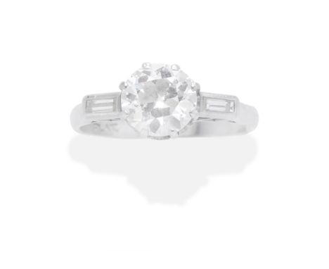 DIAMOND RINGThe old brilliant-cut diamond between baguette-cut diamond shoulders, central diamond approx. 1.40cts,  ring size
