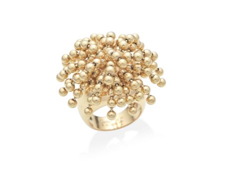 CARTIER: 'PERRUQUE' RINGThe beaded tassels, on a tapering polished band, mounted in 18 carat rose gold, signed Cartier, maker