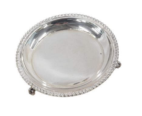 An Elizabeth II silver waiter, with gadrooned border, on short cabriole legs, with ball and claw feet, engraved to the unders