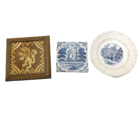 A 17thC Delft tile in blue, with a Saint bestowing a blessing, 13cm wide, a commemorative plate, and a tile decorated with a 