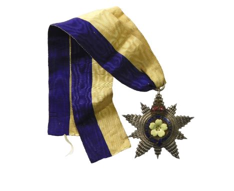 A silver gilt enamel Order of the Primrose League medal and ribbon.