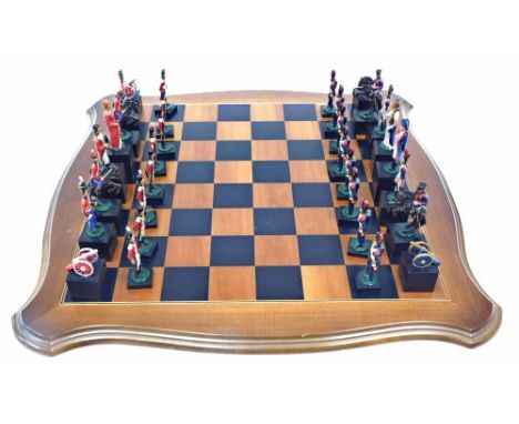A painted Battle of Waterloo chess set, each piece hand painted, with chess board.