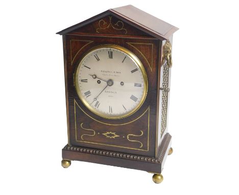 A Regency rosewood and brass inlaid mantel clock, the silvered dial stamped Gravell & Sons, London, No. 4016, on bun feet, 37