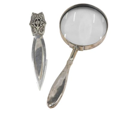A silver and marcasite ornate bookmark, and a magnifying glass with white metal handle. (2) 