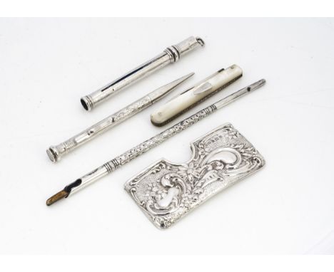 An Art Deco period sterling silver retractable pencil, together with a silver dip fountain pen, a silver pencil holder, a sil