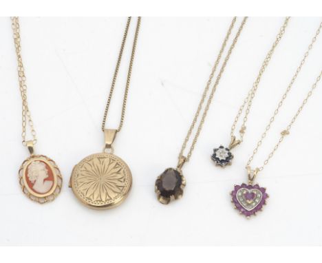 A collection of 9ct gold pendants, including lockets, ruby and diamond heart pendant, cameo pendant, all with oval and square