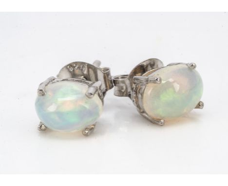 A pair of white Ethiopian opal ear studs in silver 