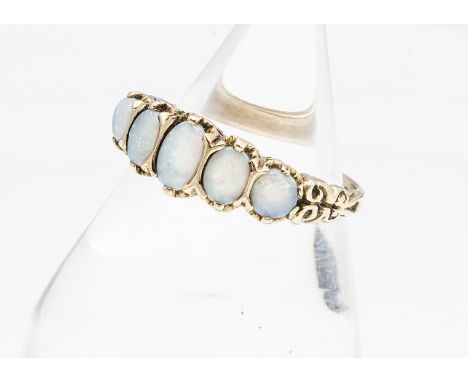 A contemporary 9ct gold Victorian style five stone opal ring, the oval polished cabochons in claw settings, ring size P 1/2, 