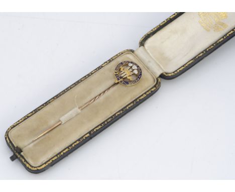 An untested 18ct gold enamel Prince of Wales stick pin, 6.7cm, 3.3g, in fitted Collingwood &amp; Co leather and velvet case w