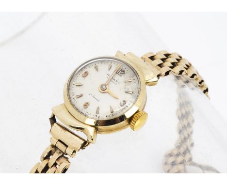A c1970s Rotary 9ct gold lady's wristwatch, 15mm circular case on 9ct gold bracelet, 13.3g, appears to run